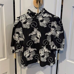 Zara black blouse with white embroidery.